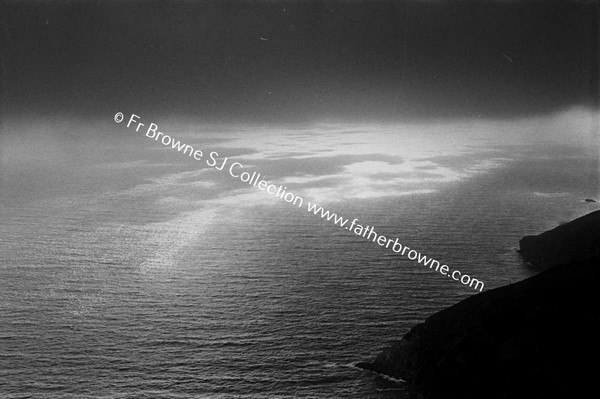 SLIEVE LEAGUE SUNLIGHT ON SEA THROUGH MIST AND CLIFFS